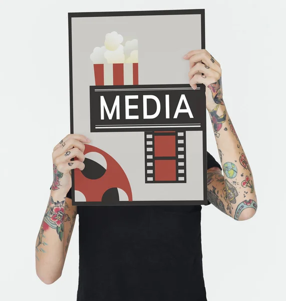 Tattooed person holding banner. — Stock Photo, Image