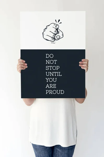 Person holding paper placard — Stock Photo, Image