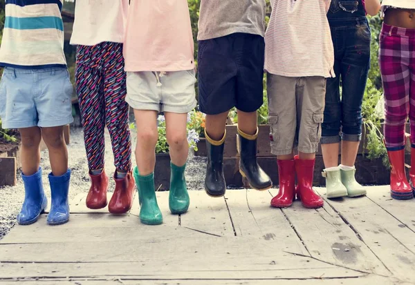 Children wearing rubber boots — Stock Photo, Image