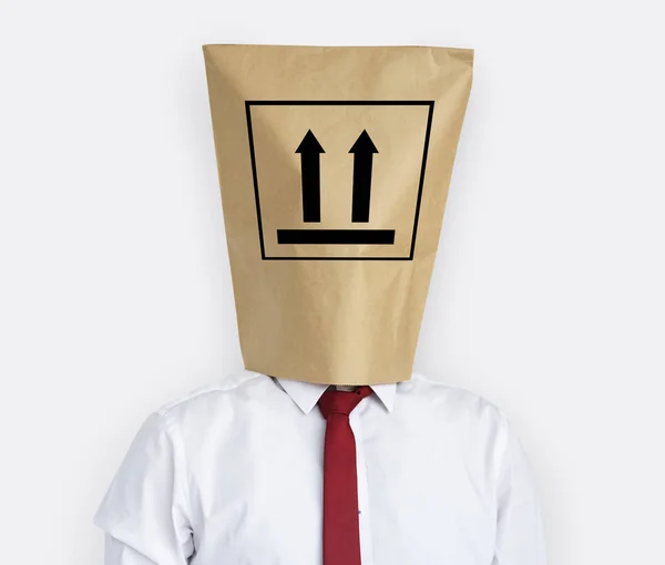 Homme d'affaires avec sac en papier sur la tête — Photo