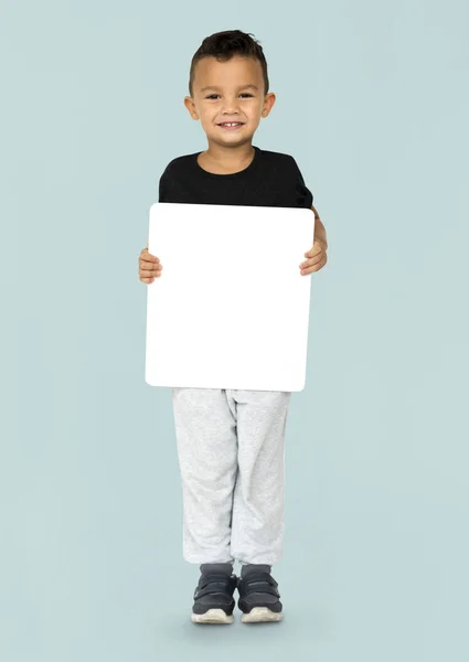 Boy holding blank board — Stock Photo, Image