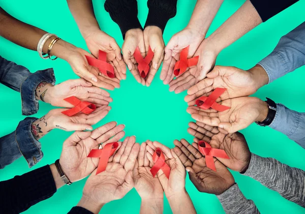 Handen tonen aids linten — Stockfoto