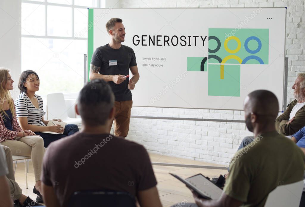 Group of people on seminar meeting, man standing near presentation board with title: Generosity