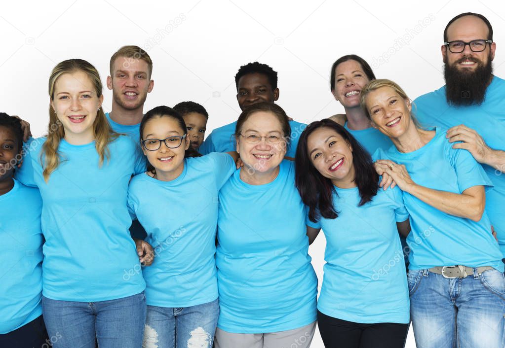 people huddle and smiling together