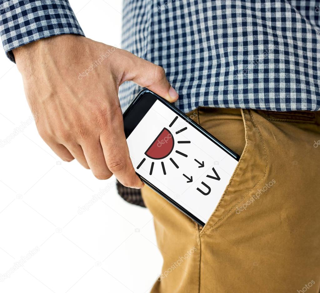 hand putting smartphone into pocket