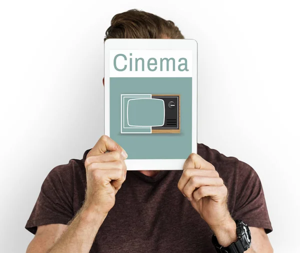 Man holding digital tablet covering face — Stock Photo, Image