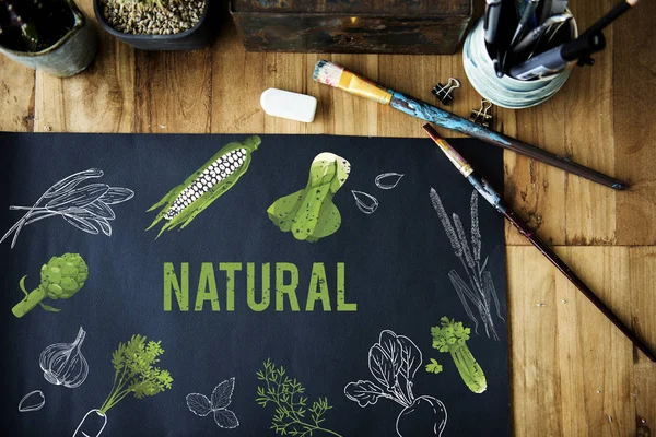 Paint brushes and placard on the table — Stock Photo, Image