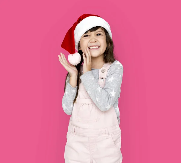 Malá holčička v klobouku Santa Claus — Stock fotografie