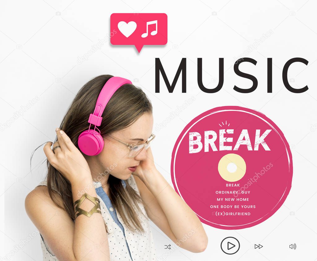 Portrait young caucasian woman listening music in pink headphones, Music Concept