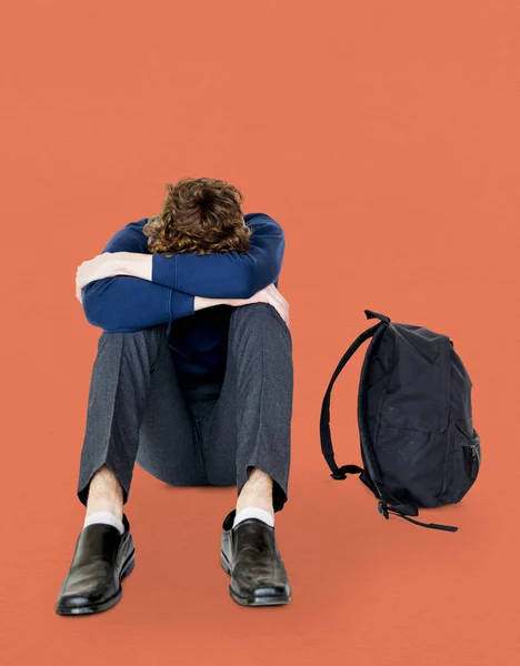 Stressato Studente seduto da solo — Foto Stock