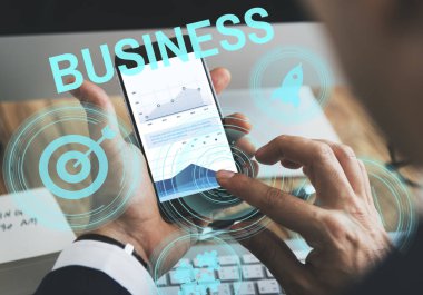 Cep telefonu kullanan iş adamı