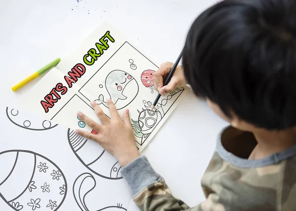 Boy doing home task — Stock Photo, Image