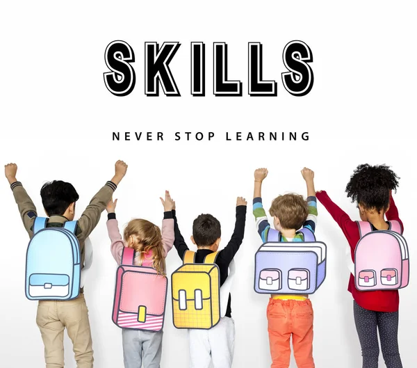 Back view at schoolchildren with backpacks — Stock Photo, Image