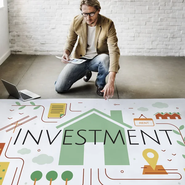 Businessman working near poster — Stock Photo, Image