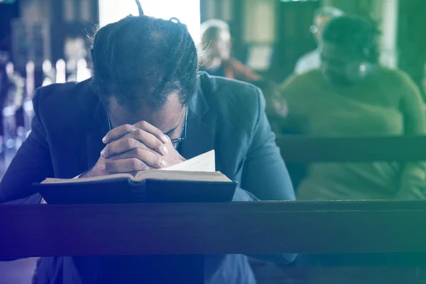 Man Praying with Bible — Stock Photo, Image