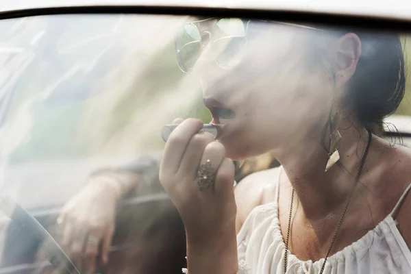 Woman Putting Lipstick on Lips — Stock Photo, Image