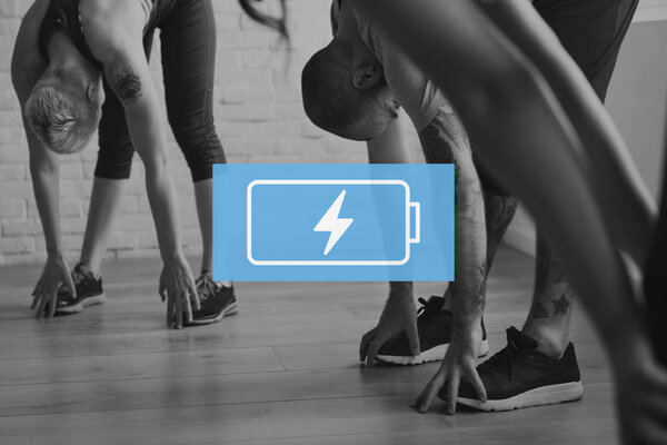 Young adults doing yoga