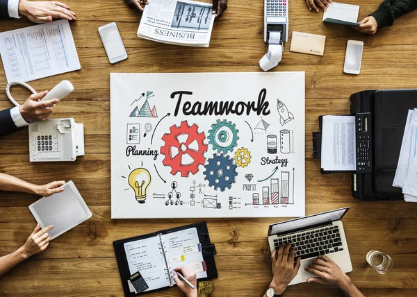 People brainstorming at table — Stock Photo, Image