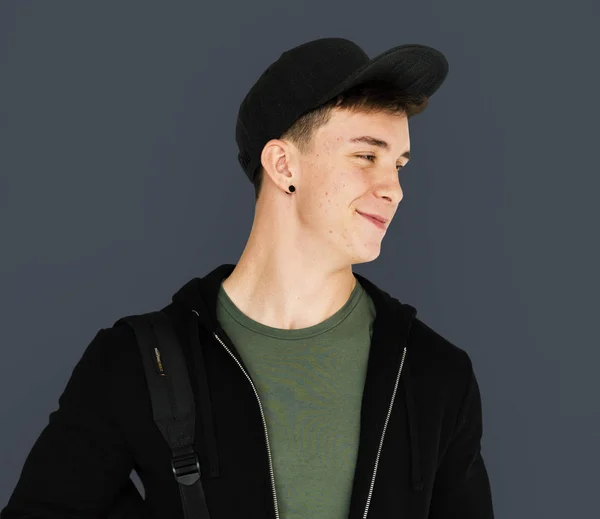 Smiling  teenager guy in the cap — Stock Photo, Image