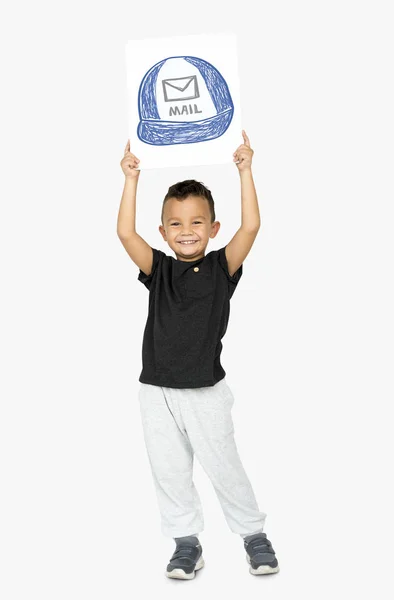 Pequeno menino segurando banner — Fotografia de Stock