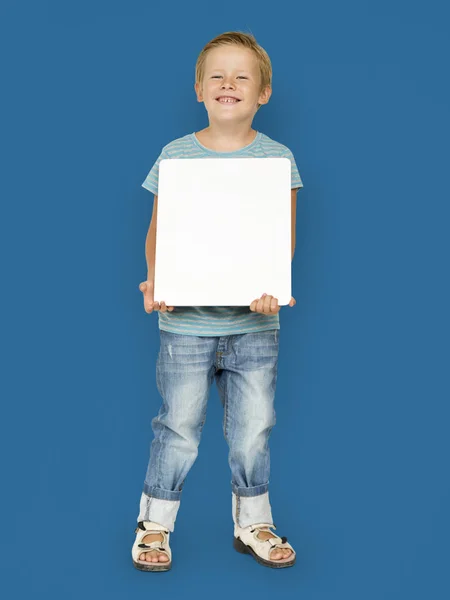 Boy holding blank board — Stock Photo, Image