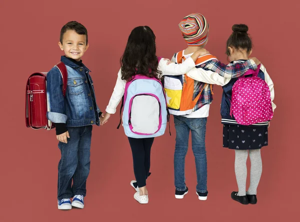 School children with backpacks — Stok fotoğraf