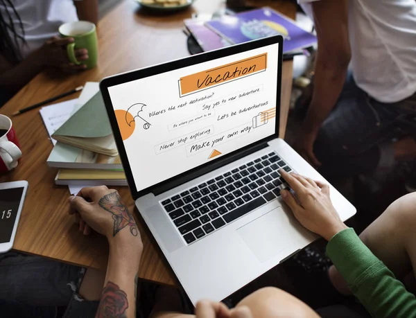 People using laptop on table — Stock Photo, Image