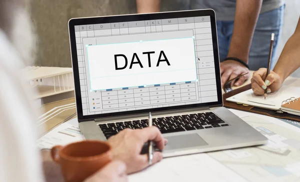 Man using laptop at table — Stock Photo, Image