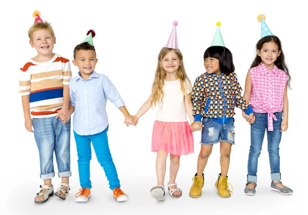Niños en sombreros de fiesta — Foto de Stock