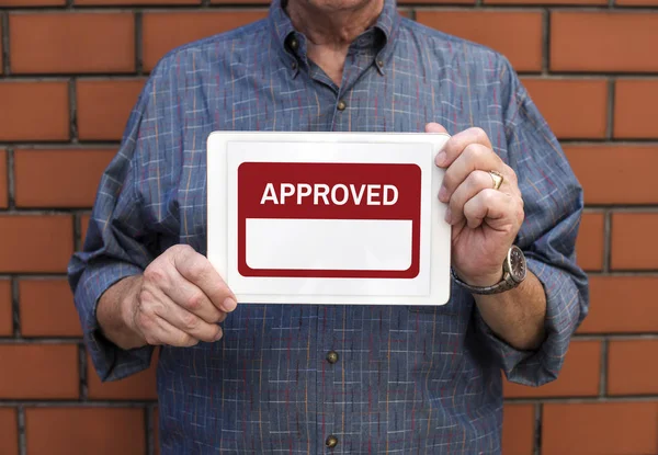 Man holding digital tablet — Stock Photo, Image