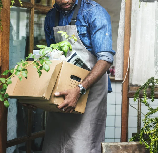 African man working in flowers shop — Stock Photo, Image