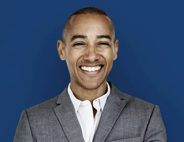 Sonriente hombre de negocios en el estudio — Foto de Stock