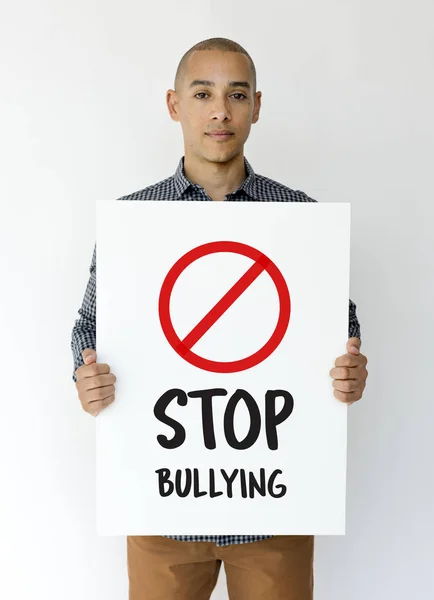 Man holding placard — Stock Photo, Image