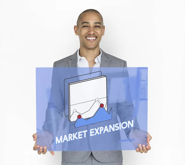 Obchodní muž držící skleněný plakát — Stock fotografie
