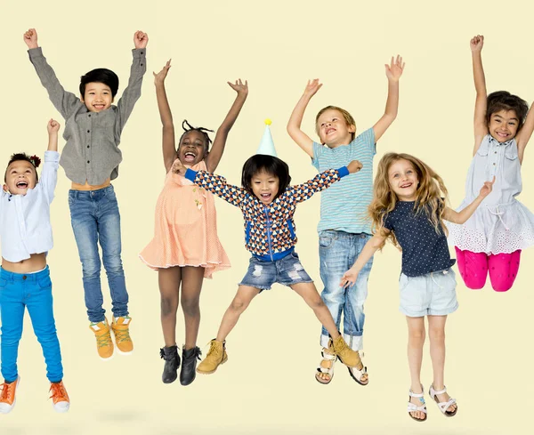 Kids jumping together — Stock Photo, Image