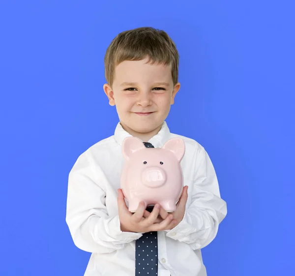 Boy holding Piggybank — Stock Photo, Image