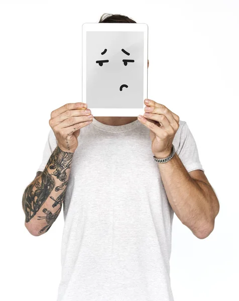 Tablet digital cobrindo rosto — Fotografia de Stock