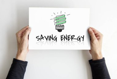 afişini holding eller