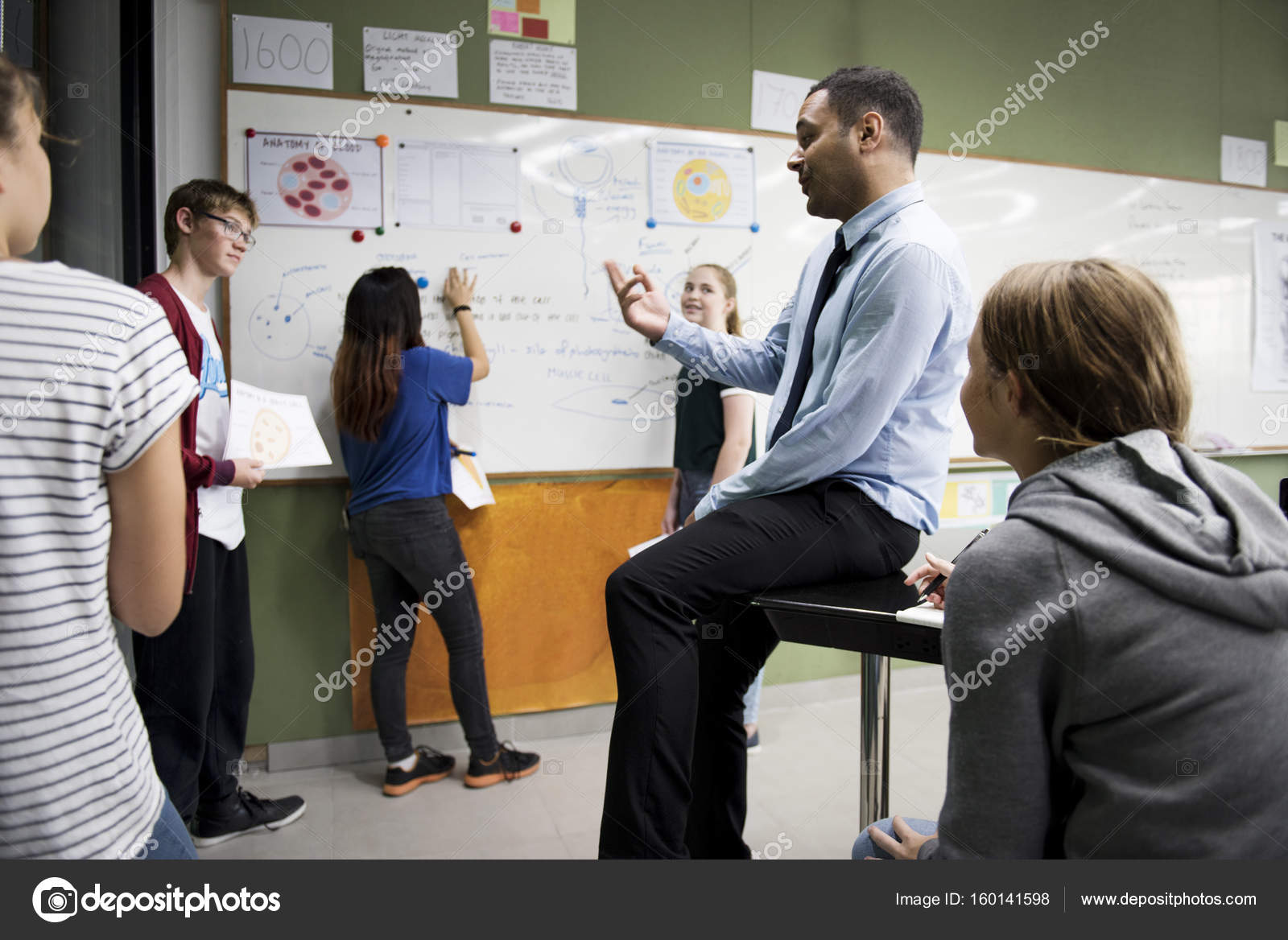 Biology teacher teaching Stock Photo by ©Rawpixel 160141598