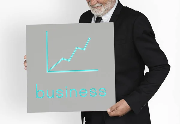 Senior Business man innehav plakat — Stockfoto