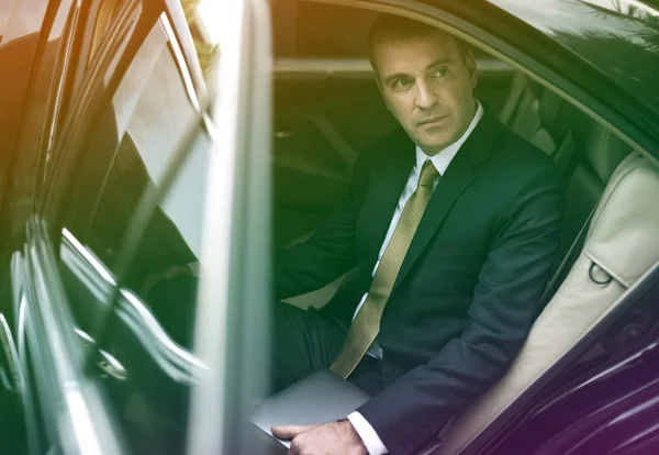 Adult Businessman in car — Stock Photo, Image