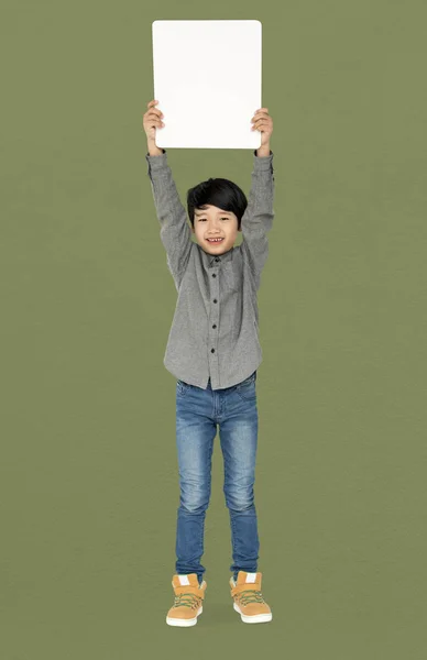 Boy holding blank board — Stock Photo, Image