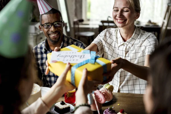 People celebrate birthday at table — Stock Photo, Image