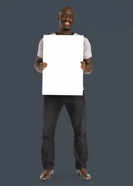 African man holding banner — Stock Photo, Image