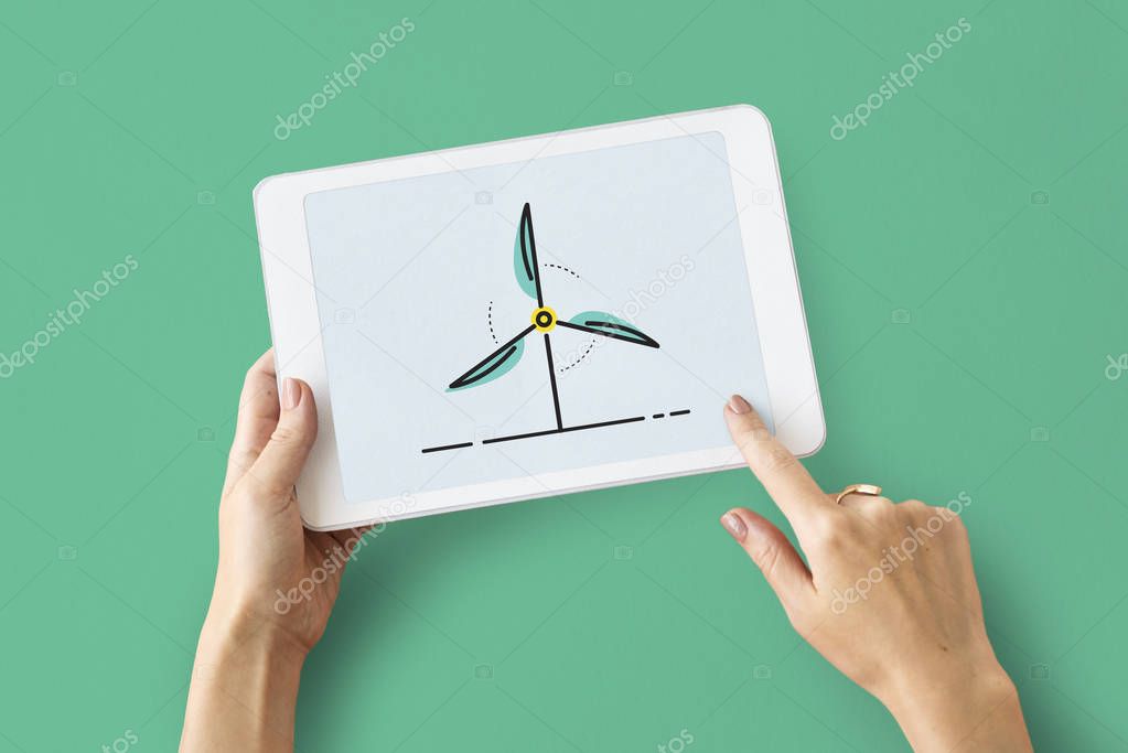 Close up of human hands using digital tablet, Energy Saving Concept