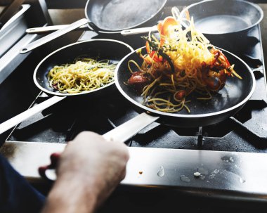 Chef cooking spagetti 