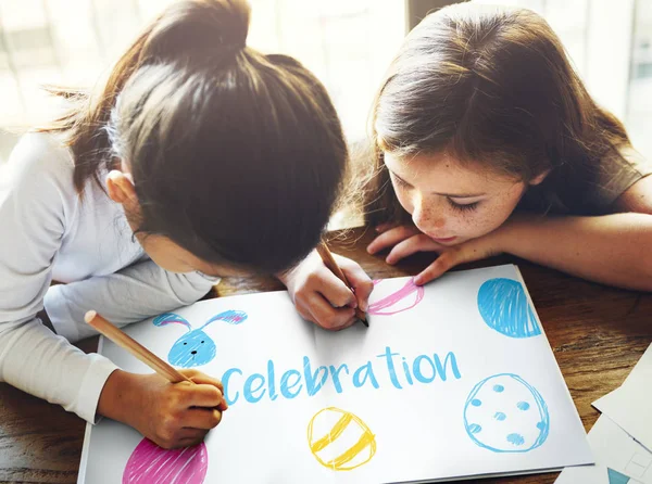 Little girls drawing easter graphics — Stock Photo, Image