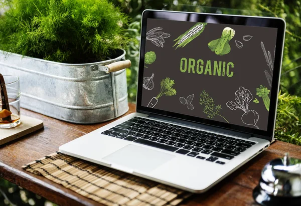 Opened laptop on wooden table — Stock Photo, Image