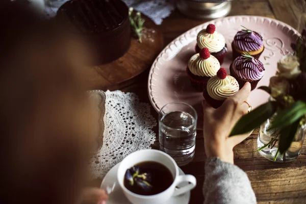 Woman eating sweet snack — Stock Photo, Image