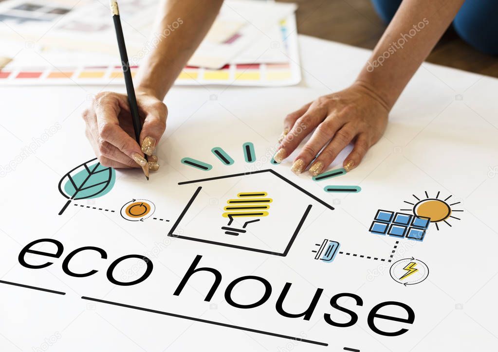 Person drawing and writing on banner with pencil, title: Eco House